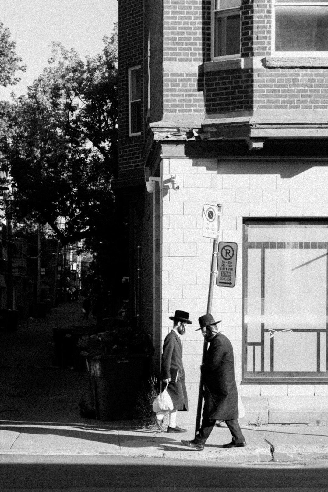 elderly couple walking neighborhood