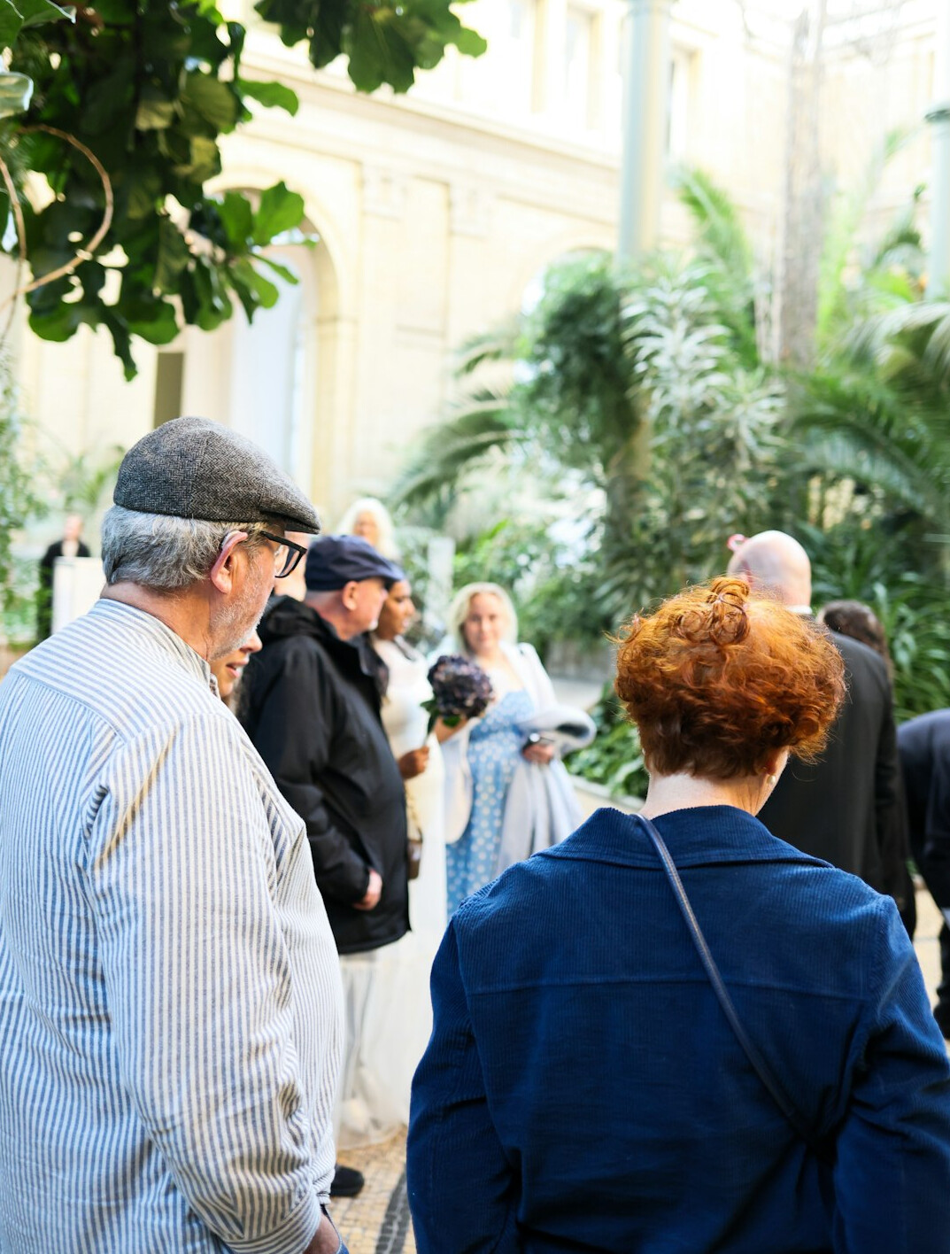elderly people chatting in garden